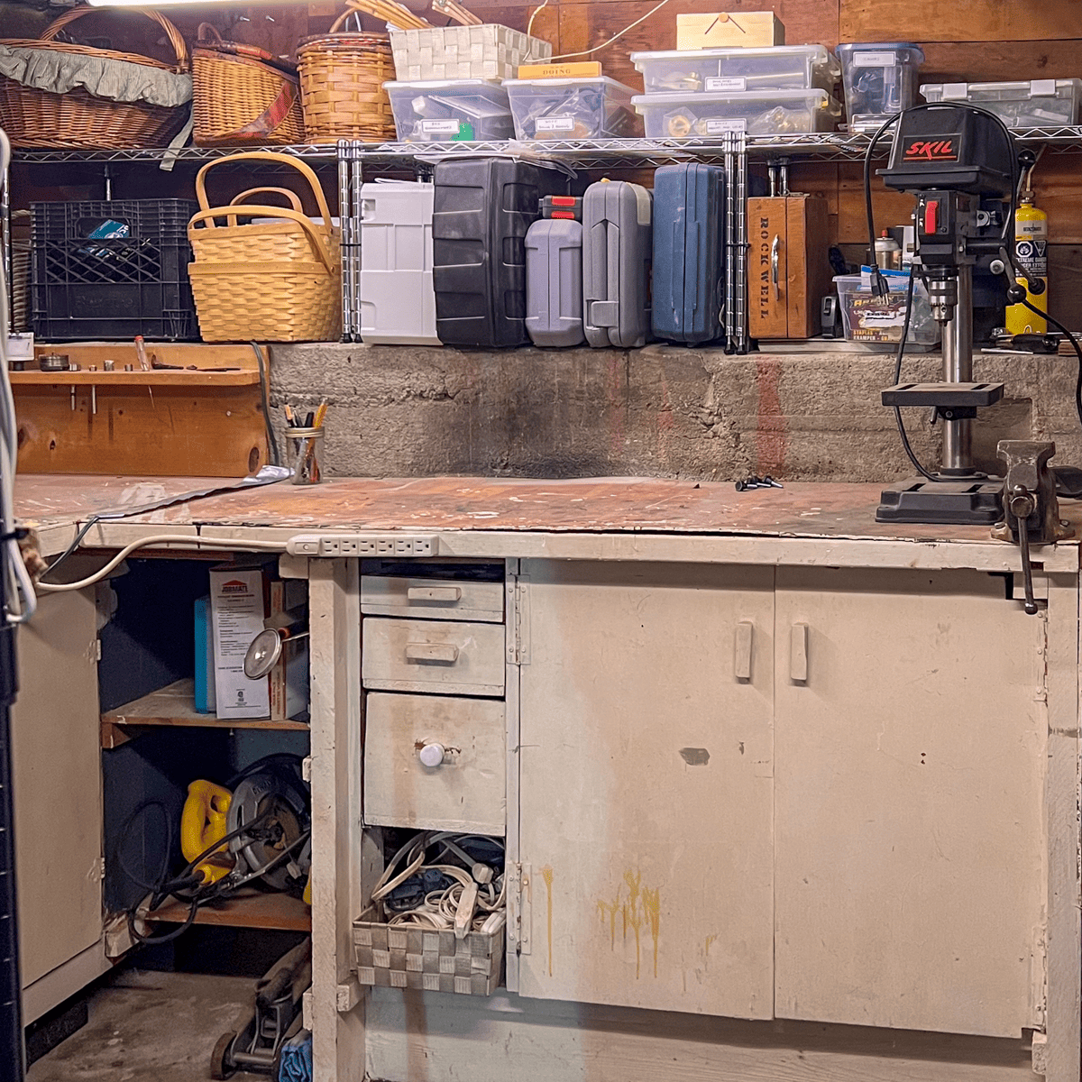A real life organized basement workshop.