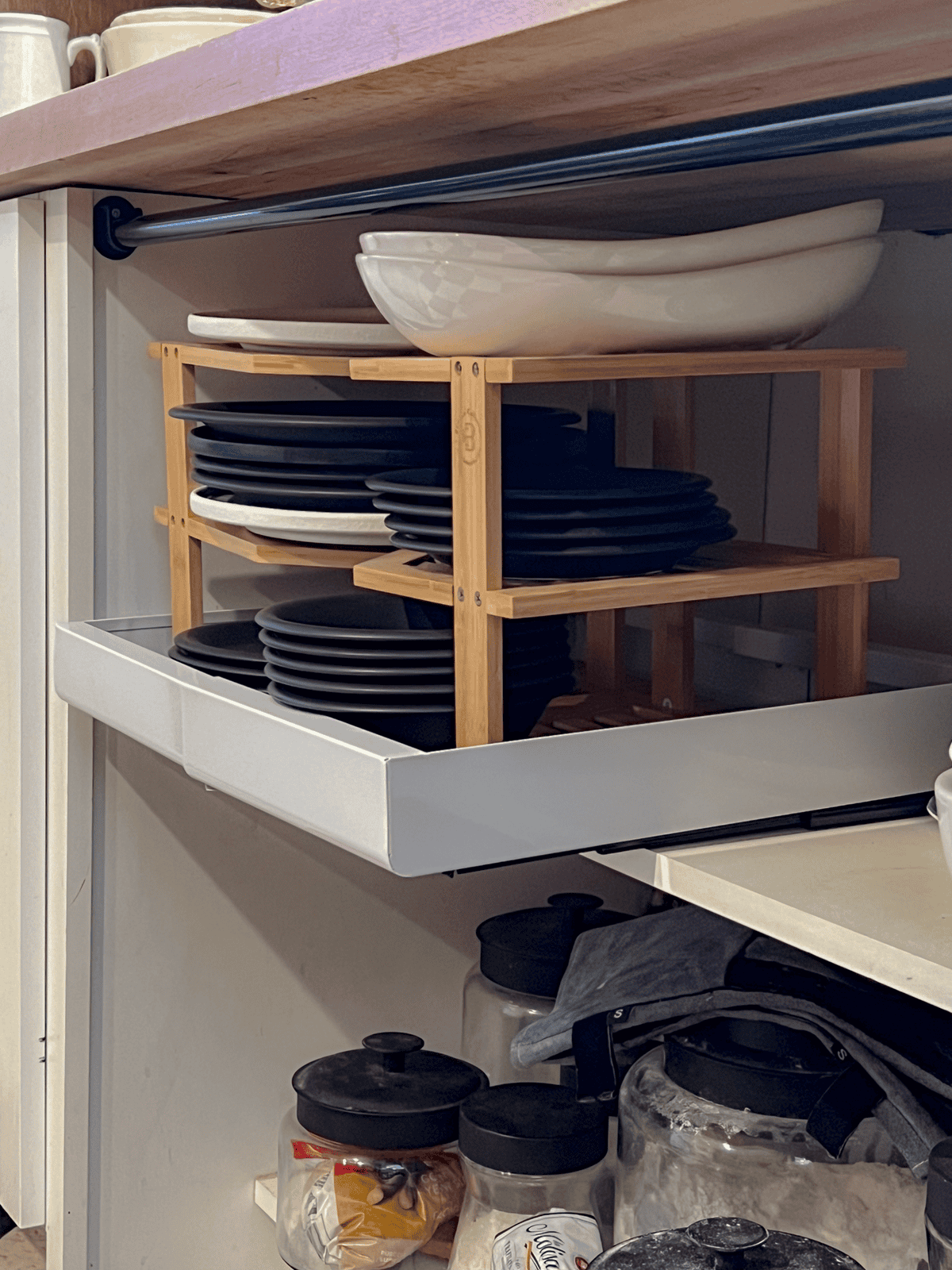 Stick down metal pull out shelf for cabinets.