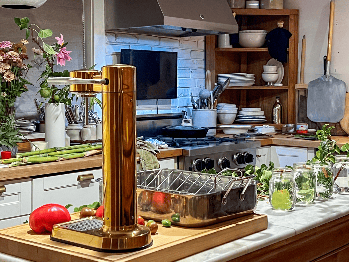 Thanksgiving dinner prep in kitchen with wood counters and antique marble island.